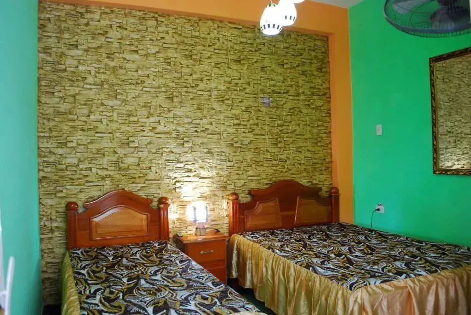 Viñales, 22400, Pinar del Rio, Cuba. En su estancia por viñales pueden disfrutar de paseos a caballo o caminando dentro del parque nacional.. Reservas online, Casa Elisa Habitación 3.